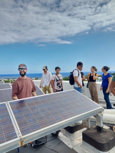 Photograph of Rodrigo Del Prado Santamaria, PhD student at DTU, on the roof of the University with other students participating in the workshop.
